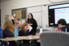 Photo of Molly Wells, a Master of Arts in Teaching program graduate, student teaching in a classroom.