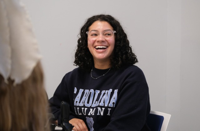 student laughing in class