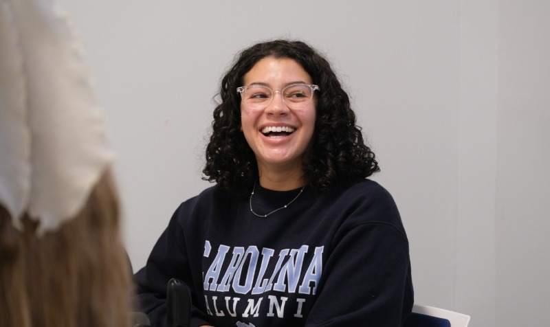 student laughing in class