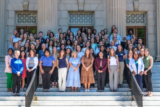 HDFS large group photo on steps outside a building