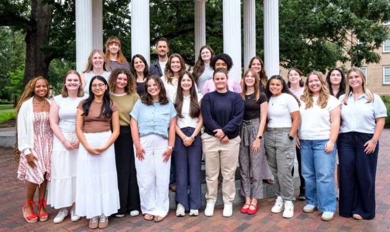 Group photo of the School counseling program's 2025-2026 cohort. Pictured outside.