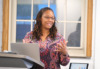 HOLD program director Jemilia Davis teaches in a Peabody Hall classroom with students engaging.
