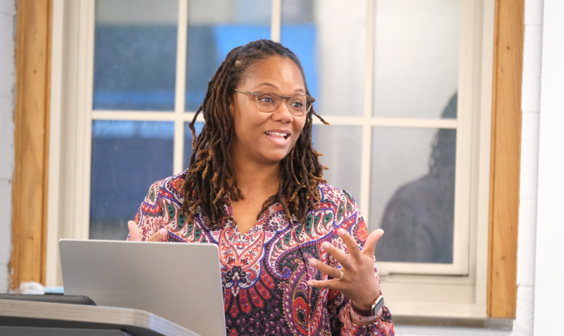 HOLD program director Jemilia Davis teaches in a Peabody Hall classroom with students engaging.
