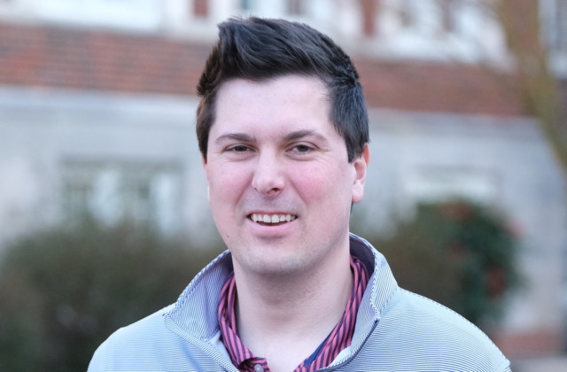 Drew Overholt poses for a photo on the UNC-Chapel Hill campus.