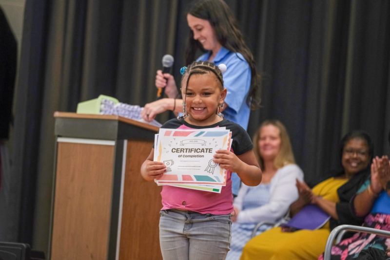 CCA student receives a certificate during the annual awards ceremony.