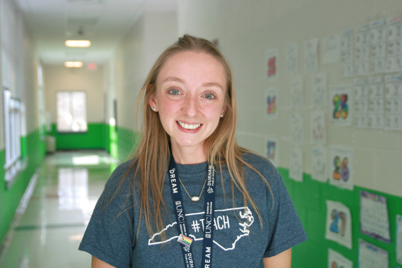 MAT alumna Megan Cannady poses in the hallway of Y.E. Smith Elementary School in Durham, North Carolina.