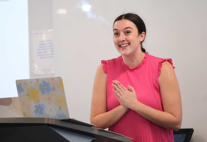 Human and Organizational Leadership Development student presents during the capstone symposium in Peabody Hall on the UNC-Chapel Hill campus.