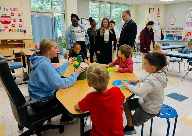NC Teaching Fellows from UNC Pembroke work with students in a classroom at CCA.