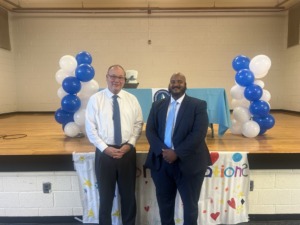 Alum Dwayne Johnson poses for a photo after being selected as the 2025-2026 Person County Schools Principal of the Year.