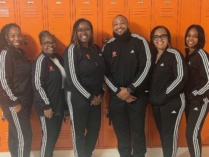 Photo of MSA alum Raymond Robinson III with his staff at Southern Middle School in Person County Schools.