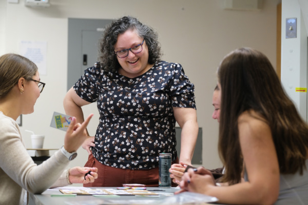 Anna Engelke provides feedback to students while they demonstrate their game.