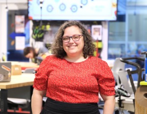 Anna Engelke poses in the BEaM Makerspace at Murray Hall