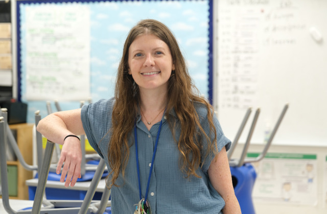 Megan Rhodes poses in her classroom.