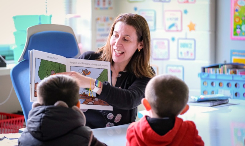 Annemarie Hindman reading to students at Carolina Community Academy.