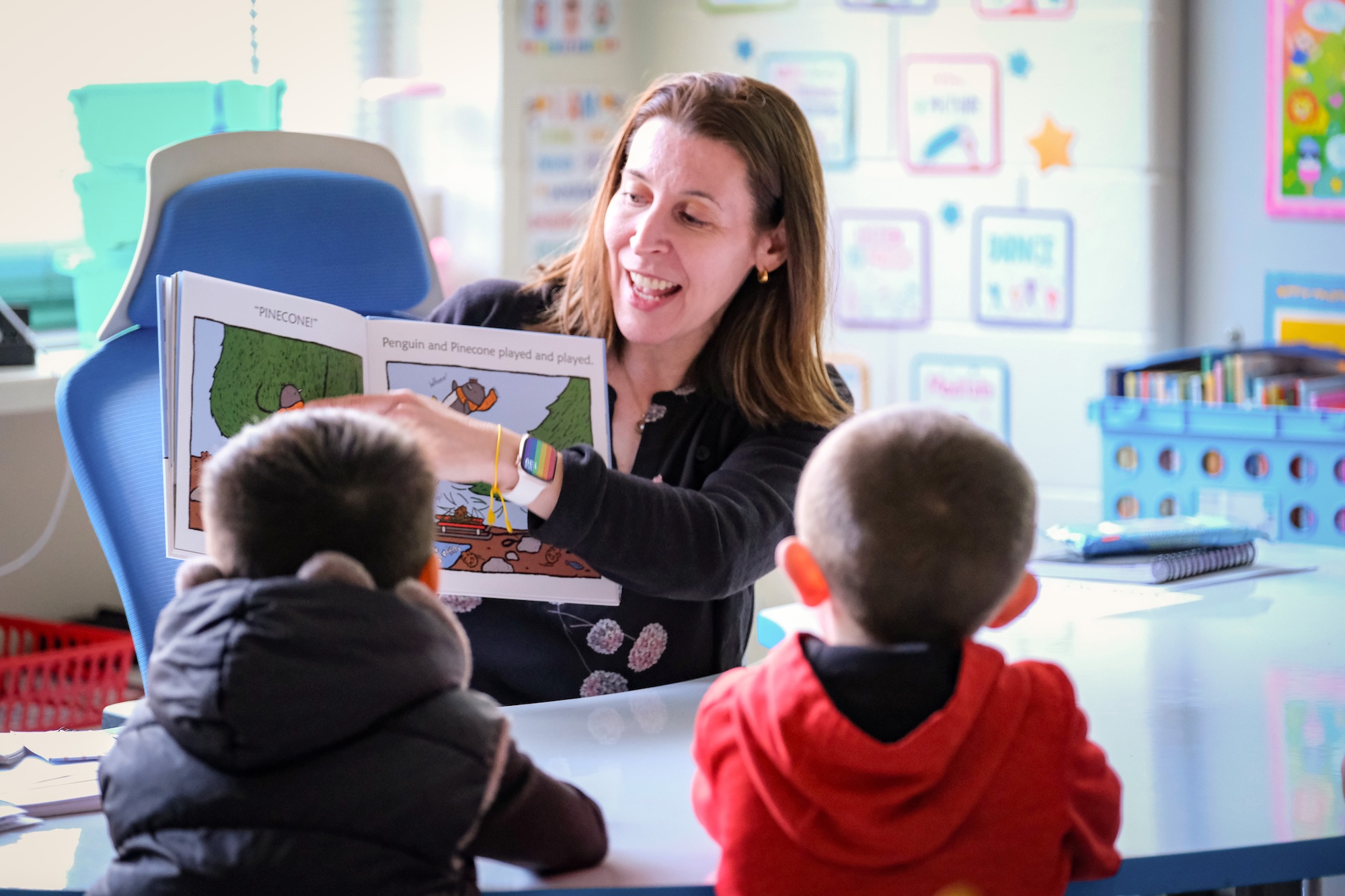 Annemarie Hindman reading to students at Carolina Community Academy.