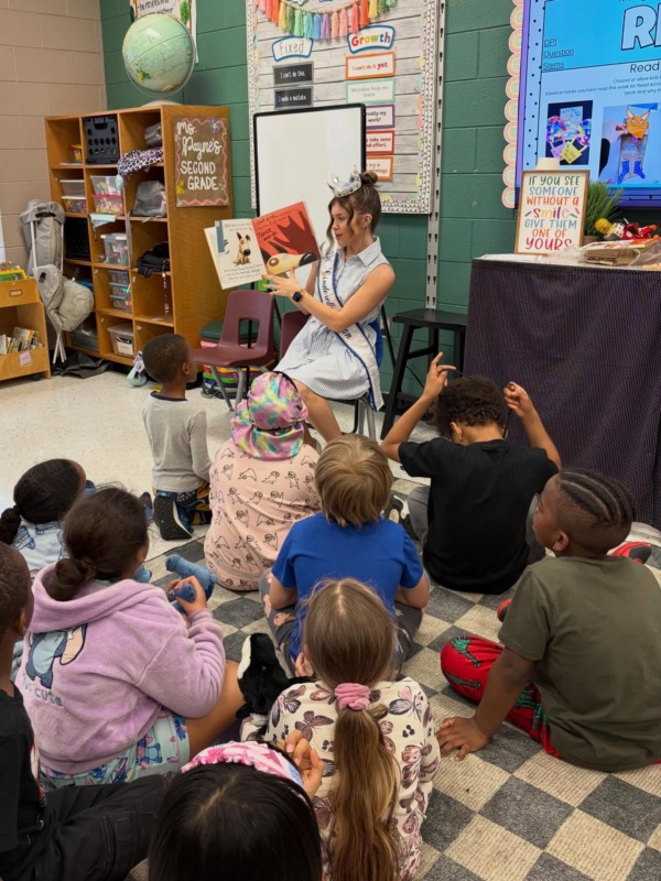 Camryn Tuttle (’26 B.A.Ed.) reads to a second-grade class in Gaston County, North Carolina, during Read Across America Week. (Photo courtesy of Camryn Tuttle)