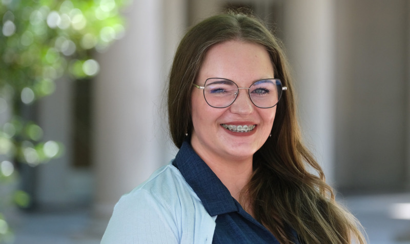 Portrait of Maggie Demarse outside of Peabody Hall on the UNC-Chapel Hill campus