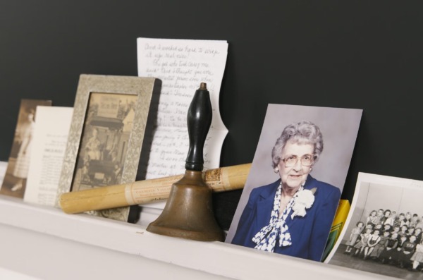 Kristin Papoi’s grandmother, Thelma Papoi, rang a bell at the start of each school day in her small Ohio town. That bell now resides with her in the UNC School of Education. (Jeyhoun Allebaugh/UNC-Chapel Hill)