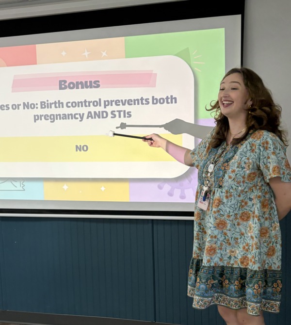 Julia Fowlkes ('26 B.A.Ed.) delivers a health education presentation.